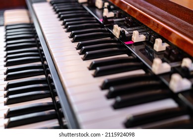 Close Up Shot Of The Keys And Draw Bars On A Hammond B3 Organ In A Recording Studio.