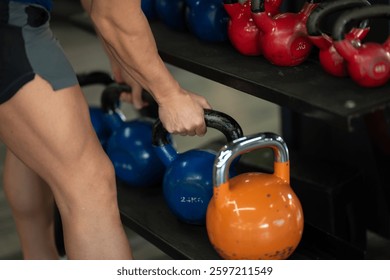 A close up shot of a man gripping dumbbells, ready to push through his intense workout in the gym, displaying focus, strength, and determination