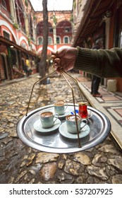 Close Up Shot Of Man Holding  Tea Tray