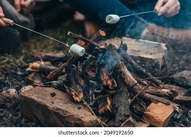 Close Shot Of A Marshmallows Above Camp Fire During Camping In The Nature