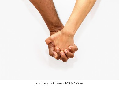 Close Up Shot Of An Mature Couple Holding Hands. Black Man And White Woman In Tender Situation Against Racism.