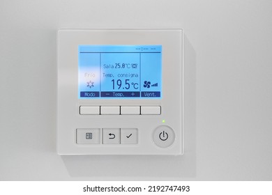 Close Up Shot Mounted On White Wall, Climate Control Show 19,5 Degrees Indoor, Remote Air-conditioner Inside Smart Home Close Up View, No People. Modern Tech, Comfort Life Concept