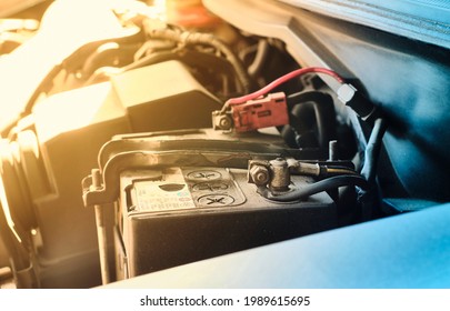 Close Up Shot Of Old Car Battery's Terminal In The Engine Bay. Battery Terminal Of An Old And Dirty Car Battery Needed To Be Matenance Or Change.