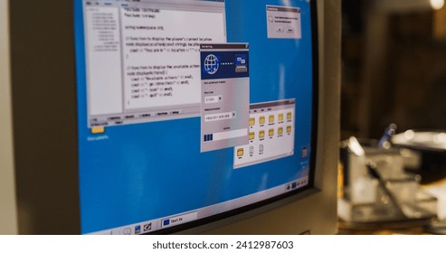 Close Up Shot Of Old Desktop Computer On Work Desk Of College Student In Nineties Retro Garage. Dated PC Is Connecting To Early Internet Through Web Browser. Exploring World Wide Web, Global Network. - Powered by Shutterstock - Get 15% off with code: PIKWIZARD15