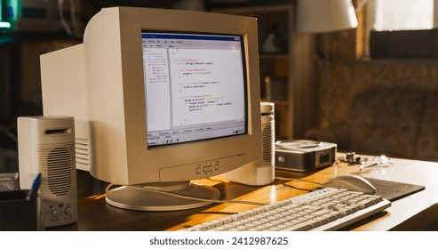 Close Up Shot Of Old Desktop Computer On Work Desk Of Software Engineer In Retro Garage. Dated PC Has Operating System Terminal Opened, Prompts Running On Screen, Code Functioning Successfully. - Powered by Shutterstock - Get 15% off with code: PIKWIZARD15