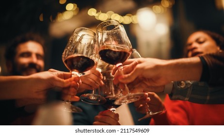 Close Up Shot of People Cheers, Making Toasts and Touch with Wine and Champagne Glasses at a Garden Party Celebration with Friends on a Warm Summer Evening. Beautiful People Enjoy Life on a Weekend. - Shutterstock ID 2117549609