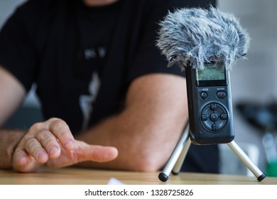 Close Up Shot Of A Portable Audio Recorder During An Interview With An Unidentified Person.