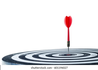 Close up shot red dart arrow on center of dartboard, metaphor to target success, winner concept, Isolated on white background with clipping path