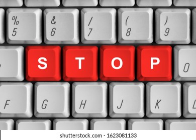 Close up shot of red "stop" buttons on the white computer keyboard.