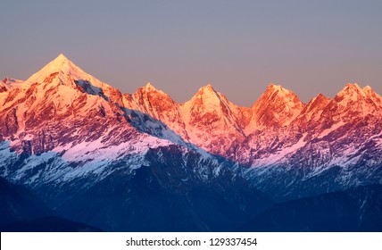 Close Shot Of Reddish Mountain Peaks During Sun Set