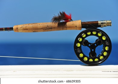 Close Up Shot Of Saltwater Fly Fishing Tackle Against Sea