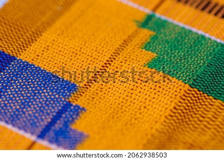 Close up shot with selective focus on kente cloth