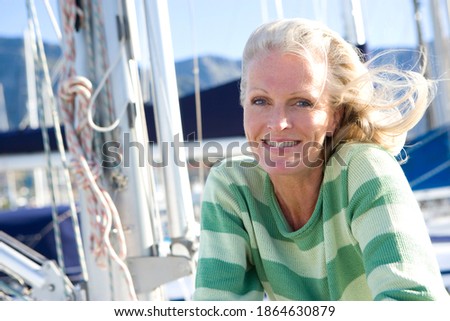 Similar – Yachten und Boote, die in einem Hafen liegen.