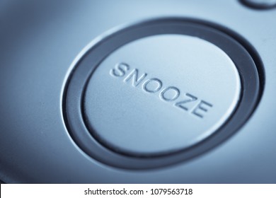Close up shot of a snooze button of an electronic clock.