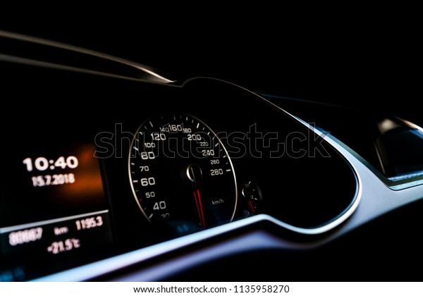 Close up shot of a speedometer in a car. Car\
dashboard. Dashboard details with indication lamps.Car instrument\
panel. Dashboard with speedometer, tachometer, odometer. Car\
detailing. Modern\
interior