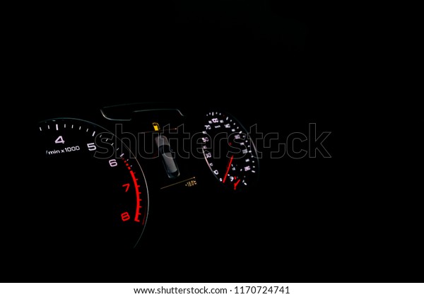 Close up shot of a speedometer in a car. Car
dashboard. Dashboard details with indication lamps.Car instrument
panel. Dashboard with speedometer, tachometer, odometer. Car
detailing. Modern
interior