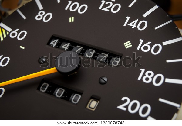 Close up shot of a speedometer in a car. Car\
dashboard. Dashboard details with indication lamps.Car instrument\
panel. Dashboard with speedometer, tachometer, odometer. Car\
detailing. Modern\
interior