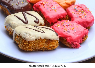 Close Up Shot Of Sweet Banana Nugget With Playful Chocolate Toppings For Birthday Parties.