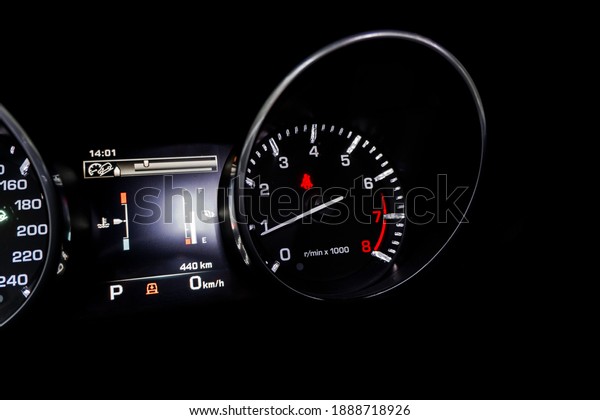 Close\
up shot of a tachometer in a car. Car dashboard. Dashboard details\
with indication lamps. Car instrument panel. Dashboard with\
speedometer, tachometer, odometer. Car\
detailing.