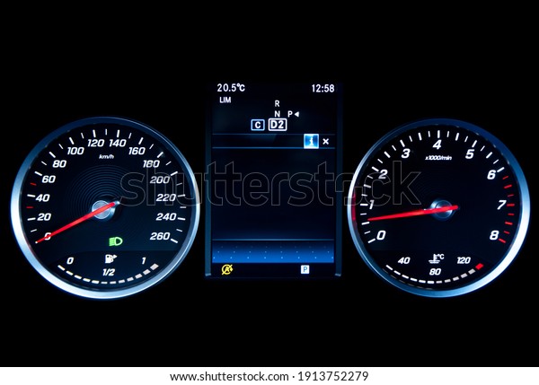 Close
up shot of a tachometer in a car. Car dashboard. Dashboard details
with indication lamps. Car instrument panel. Dashboard with
speedometer, tachometer, odometer. Car
detailing.