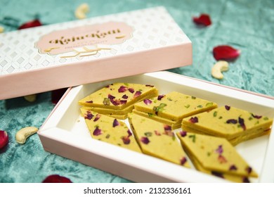 Close Up Shot Of Thandai Kaju Katli With Saffron And Box 