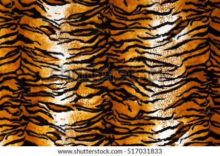 Close up shot of tiger print carpet.