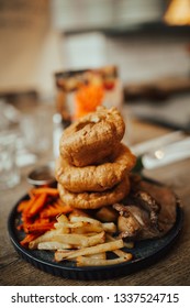 A Close Up Shot Of Traditional British Food, Sunday Roast. Yorkshire Pudding With Roasted Meat And Vegetables. Concept Of Family Lunch, Celebration And Traditional Cuisine.