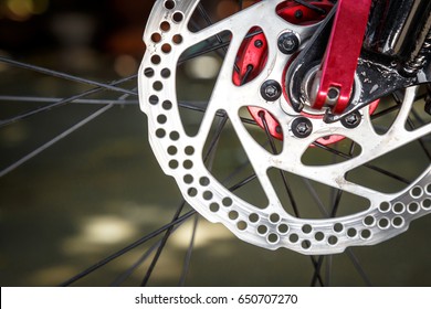 Close Up Shot Of The Tread On A Fat Mountain Bike Tire Disk Brake.