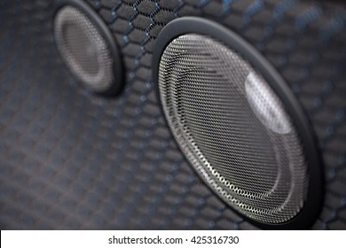 Close Up Shot Of Two Round Speakers In A Car.