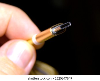 Close up shot of an USB Type-C connection on an isolated background