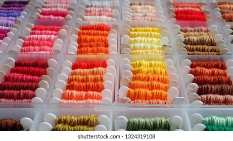 Close Up Shot Of Vibrant Colorful Embroidery Floss Cross Stitch String Kit Prewound On Bobbins For Crafts And Hobbies