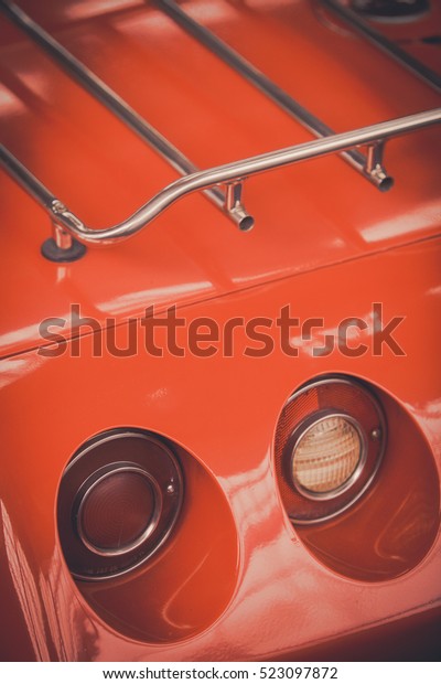 Close up shot of a\
vintage car rear lights.