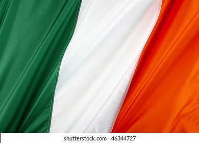 Close up shot of wavy, colorful Irish flag