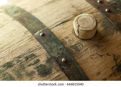 Close Up Shot Of A Wooden Barrel With A Wooden Bung