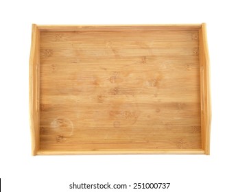 A close up shot of a wooden breakfast tray
