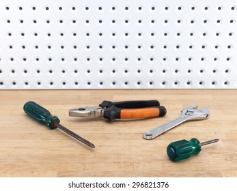 A close up shot of a workshop peg board - Powered by Shutterstock