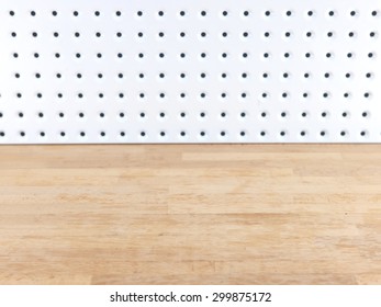 A Close Up Shot Of A Workshop Peg Board