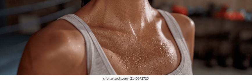 Close Up Of Shoulders And Neck Fit Female With Sweat On Skin After Workout