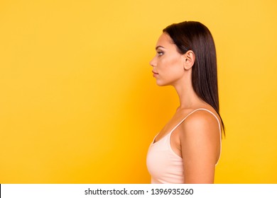 Close Up Side Profile Photo Beautiful She Her Lady Look Empty Space Not Smiling Zombie Facial Expression No Emotions Stare Wear Casual Pastel Tank-top Outfit Clothes Isolated Yellow Bright Background