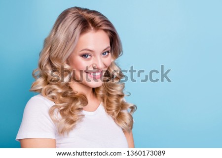 Close up side profile photo beautiful amazing attractive her she lady pretty dimples cheeks cheekbones sincerely look  wear casual white t-shirt clothes outfit isolated bright blue background