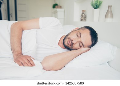 Close Up Side Profile Photo Fall Asleep He Him His Attractive Guy Vacation Sunday Saturday Daily Dream Eyes Closed Lean Head Arm Hand White Nightwear Sleep Wear T-shirt Lying Bed Bright Room Indoors