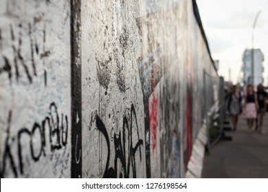 Close Up Side View Of Art On The Berlin Wall 