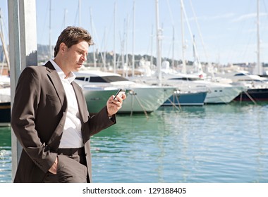 Close up side view of a businessman using his 