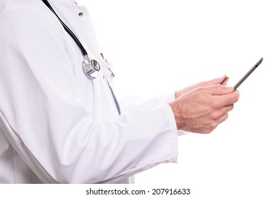 Close Up Side View Of The Hands Of A Male Doctor In A Lab Coat And Stethoscope Working On A Tablet Computer To Access Or Store Patient Information, Isolated On White