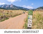 Close up of a sign at the entrance to the Chautauqua Park Hiking area in Boulder, Colorado.