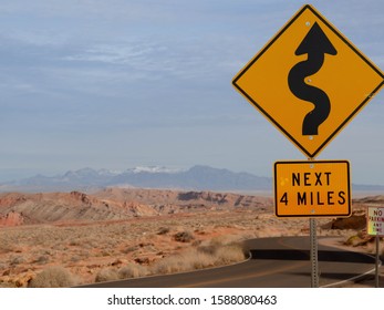 Close Up Of The Sign Indicating The Succession Of Curves Through The Rocky Mountains In The Valley Of Fire. Nevada State United States Of America.