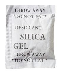 Close Up Silica Gel Or Desiccant In Paper Bag Isolated On White, Include Clipping Path