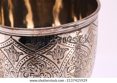A close up of silver hallmarks