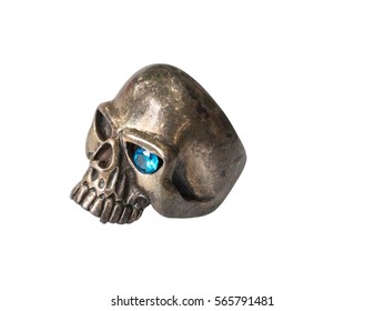Close up : Silver Human Skull Ring with Blue Jewelry on the Eye Isolated on White Background