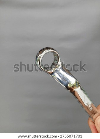 close up silver ring spanner